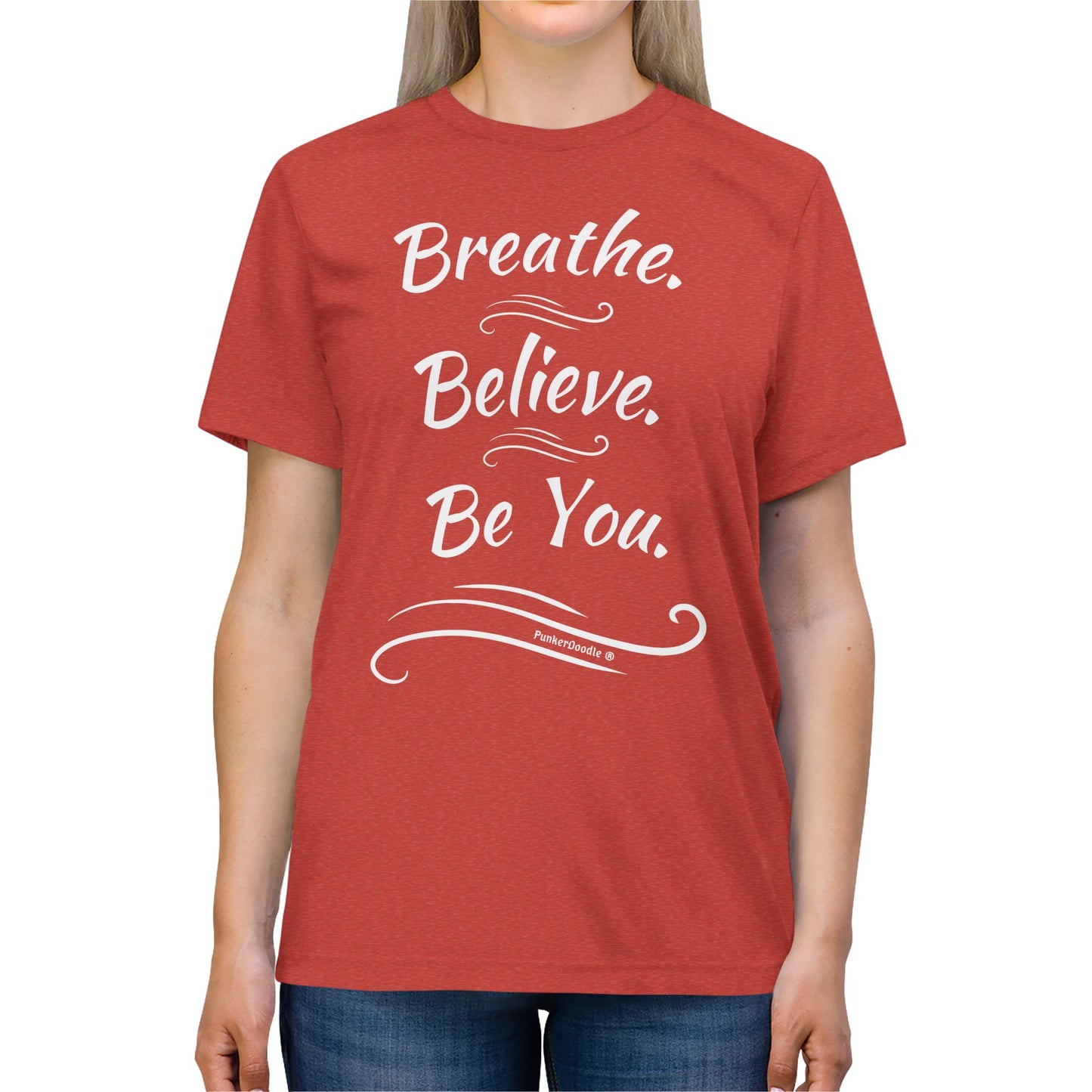 Woman in rust-colored T-shirt with encouraging message Breathe Believe Be You by PunkerDoodle®