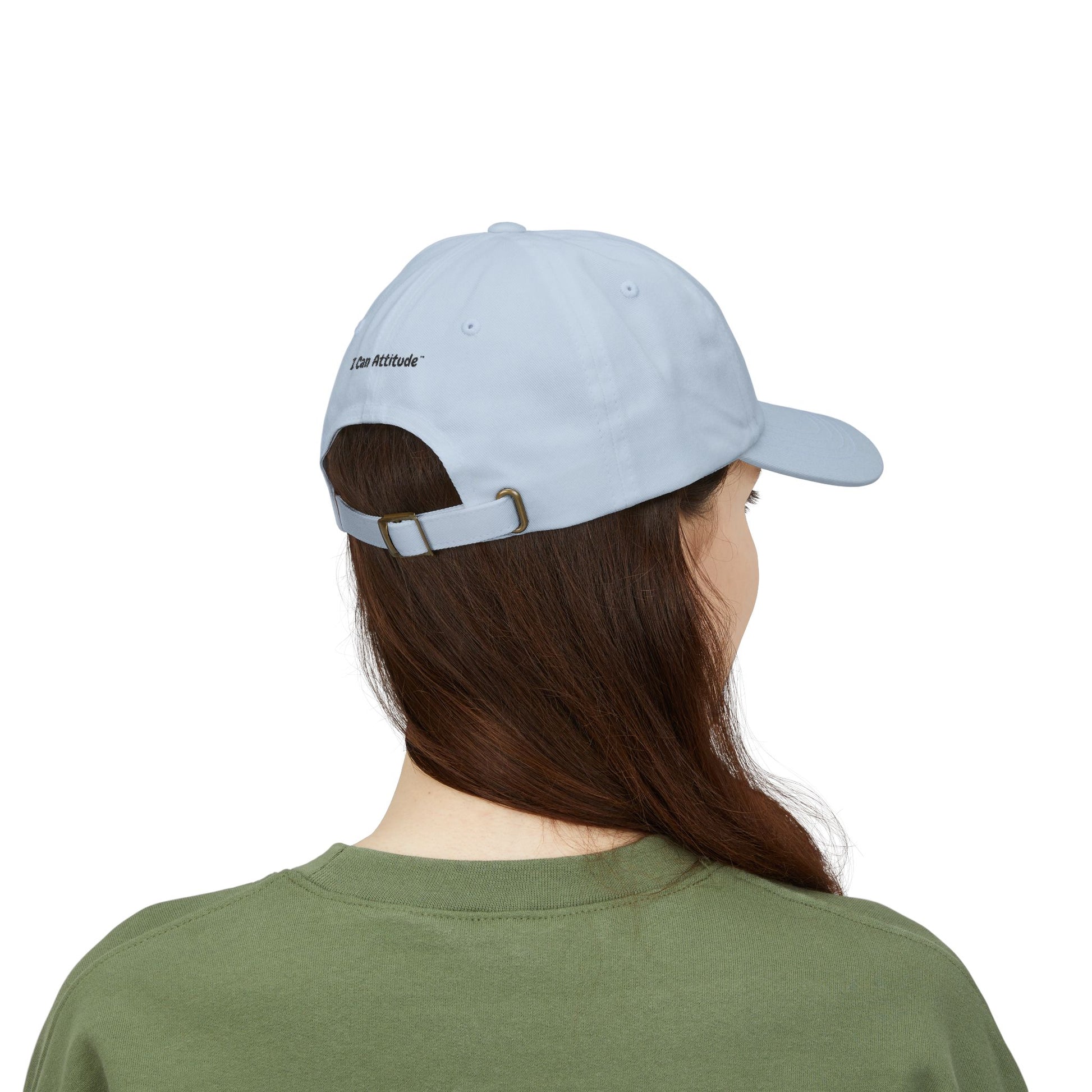 back side of blue cap with I Can Attitude™ and on a head